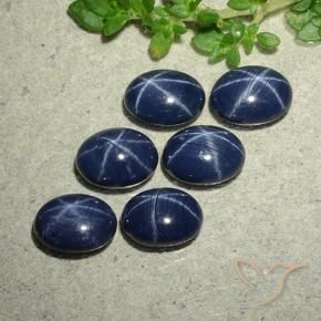 Star Sapphire Gemstones in 7 x 5 mm (calibrated) Size for Sale, Star Sapphire Stones in Deep Navy Blue Color