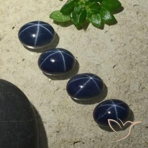Star Sapphire Gemstones in 7 x 5 mm (calibrated) Size for Sale, Star Sapphire Stones in Deep Navy Blue Color