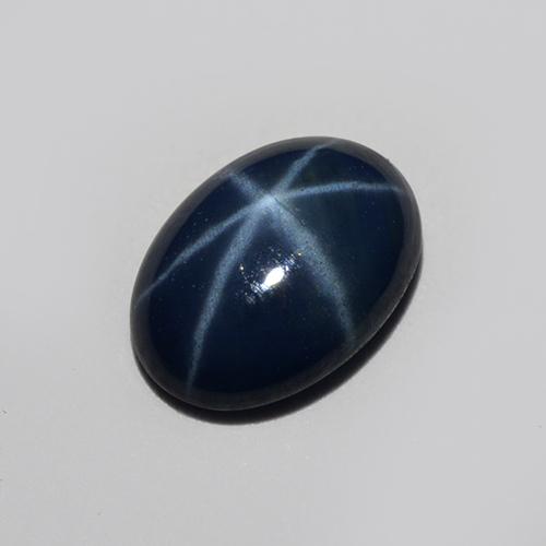 Темно-синий Звездчатый Сапфир Камень - 0.9ct Овал Кабошон (ID: 516403)