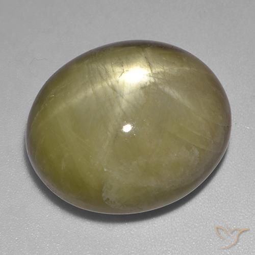 48.29 ct Yellow Star Sapphire Stone, Natural Star Sapphire in Oval Cabochon Shape for Sale
