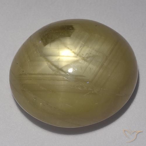 28.87 ct Yellow Star Sapphire Stone, Natural Star Sapphire in Oval Cabochon Shape for Sale
