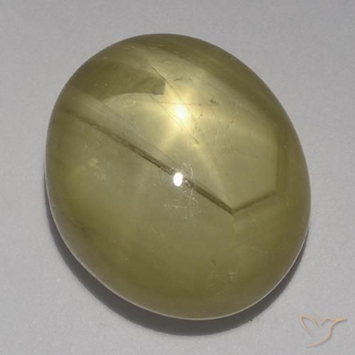32.58 ct Yellow Star Sapphire Stone, Natural Star Sapphire in Oval Cabochon Shape for Sale