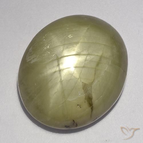 23.11 ct Yellow Star Sapphire Stone, Natural Star Sapphire in Oval Cabochon Shape for Sale