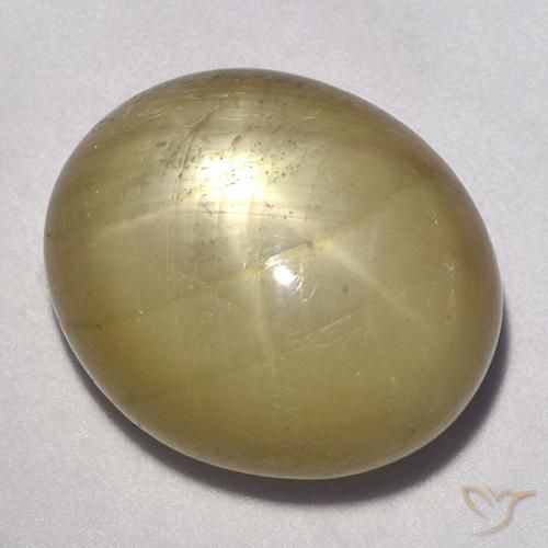 35.27 ct Yellow Star Sapphire Stone, Natural Star Sapphire in Oval Cabochon Shape for Sale