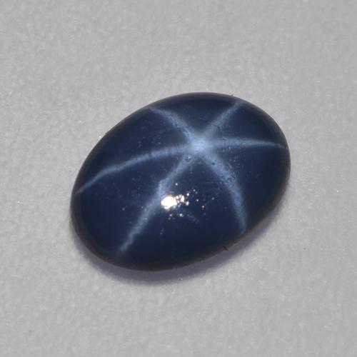 Темно-синий Звездчатый Сапфир Камень - 0.9ct Овал Кабошон (ID: 526355)
