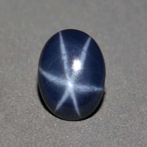 Zafiro Estrella Azul oscuro Ovalada de 0.97 ct de Madagascar, dimensión 7,1 x 5,3mm, piedra preciosa natural Difundido, claridad Opaco, Zafiro Estrella Cabujón Óvalo de 1 pieza, dureza de Mohs de 9 Adecuado para joyas de uso diario , Photo A