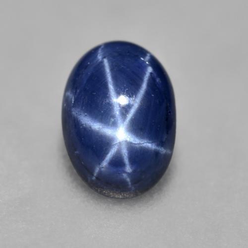 Deep Blue Star Sapphire Gem - 0.9ct Oval Cabochon (ID: 557416)