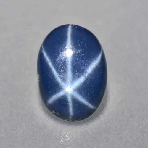 Deep Blue Star Sapphire Gem - 0.9ct Oval Cabochon (ID: 557624)
