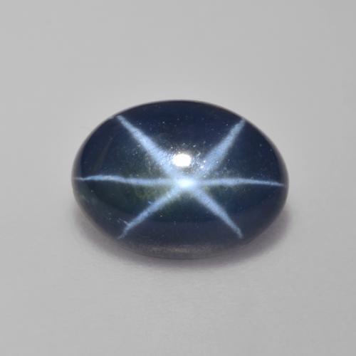 Темно-синий Звездчатый Сапфир Камень - 3.9ct Овал Кабошон (ID: 590489)