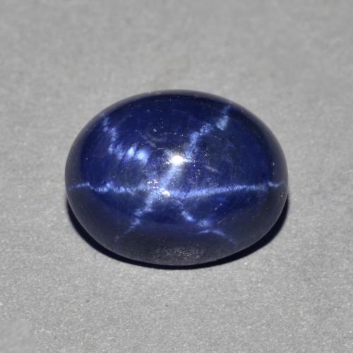 10.1 x 8.2mm Oval Cabochon Blue Star Sapphire from Thailand, Weight of 4.31ct, Natural diffused Gemstone in Opaque Clarity, 1pc Star Sapphire - Color: Navy Blue, Mohs Hardness of 9 suitable for daily wear jewelry, Photo A