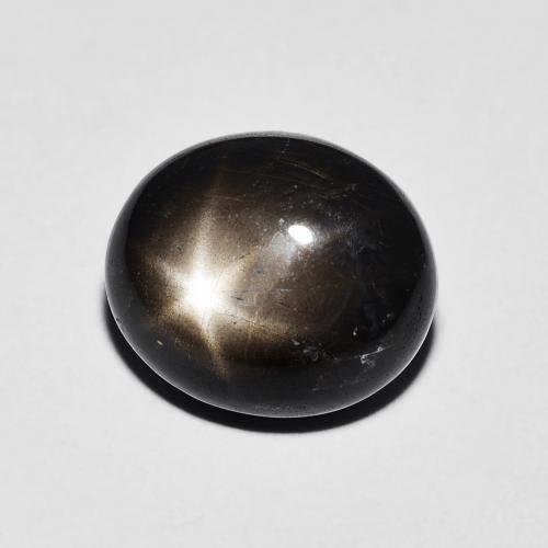 Zafiro Estrella Negro Cabujón Óvalo de 6.92 ct de Tailandia, dimensión 10,8 x 9,3mm, piedra preciosa natural Caliente, claridad Opaco, Zafiro Estrella de 1 pieza en color Negro, dureza Mohs de 9 Adecuado para joyas de uso diario, Photo A