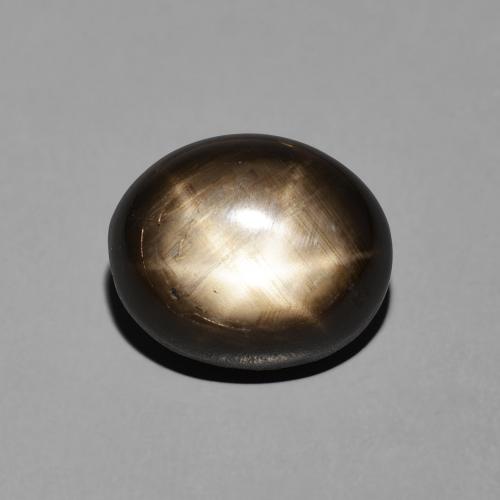 11,9 x 9,9mm Zaffiro stellato nero Ovale cabochon dalla Thailandia, peso di 7,81 ct, pietra preziosa naturale Riscaldato in purezza Opaque, Zaffiro stellato 1pz - il colore è Nero, durezza Mohs di 9 adatto per gioielli da indossare ogni giorno, Photo A