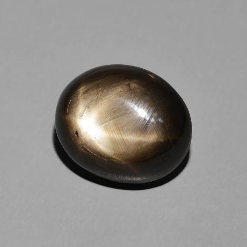 7.81 ct Black Star Sapphire Stone, Natural Star Sapphire in Oval Cabochon Shape for Sale