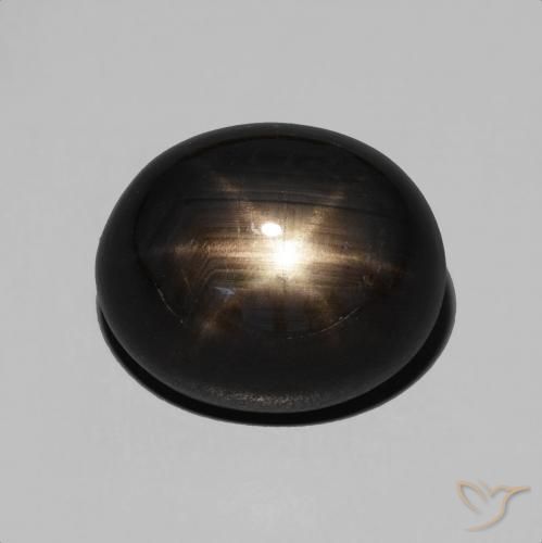 8,66 ct ovaler schwarzer Sternsaphir aus Thailand, Größe 11,9 x 9,8mm, Garantiert natürlicher Edelstein, Opaque Reinheit, 1 Stück Sternsaphir in Schwarz Farbe, Mohs-Härte von 9 Geeignet für den täglichen Gebrauch im Schmuck, Photo A