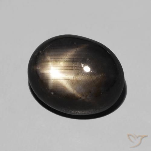 7.18 ct Black Star Sapphire Stone, Natural Star Sapphire in Oval Cabochon Shape for Sale