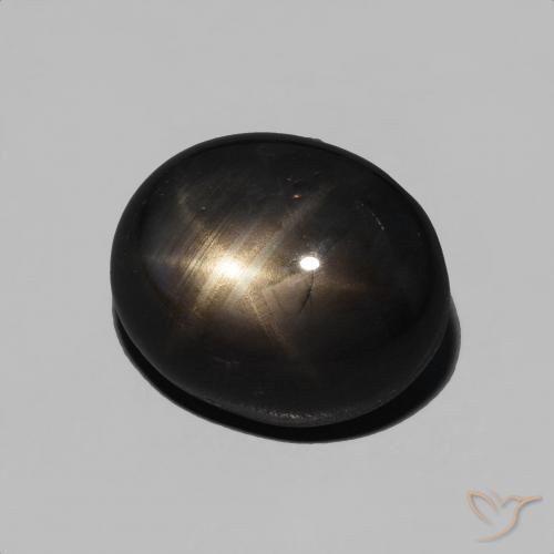 6.71 ct Black Star Sapphire Stone, Natural Star Sapphire in Oval Cabochon Shape for Sale