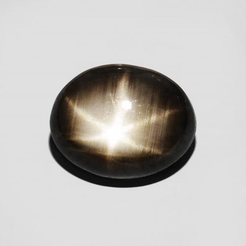 10,8 x 8,6mm ovaler schwarzer Sternsaphir aus Thailand, Gewicht von 5,17 ct, natürlicher Edelstein in Opaque Reinheit, 1 Stück ovaler Sternsaphir - Farbe: Schwarz, Mohs-Härte von 9 Geeignet für den täglichen Gebrauch im Schmuck, Photo A