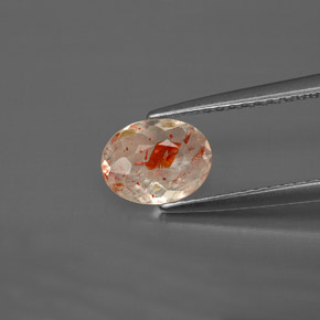 0.69 ct Orange Sunstone Gemstone, Sunstone Gem in Oval Facet Shape for Sale.