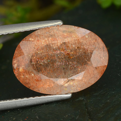 マリ産4,92カラットオーバルライトオレンジサンストーン、寸法14,1 x 10,1 mm、天然未処理宝石、半透明クラリティ、1個オーバルサンストーン、モース硬度6 - 6,5, Photo A