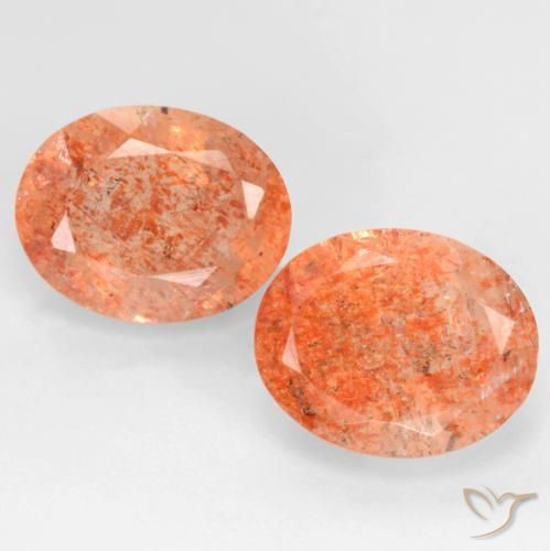 Coppia Eliolite o pietra del sole Ovale abbinata 10,1 x 7,9mm - Peso 5,15 ct totali / media. 2,58 ct ciascuno, pietra preziosa naturale non trattati, colore Arancio Medio in purezza Translucent, durezza Mohs 6 - 6,5, Photo A