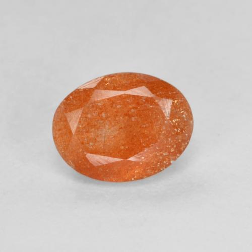 Reddish Orange Sunstone Gem - 1.4ct Oval Facet (ID: 594580)