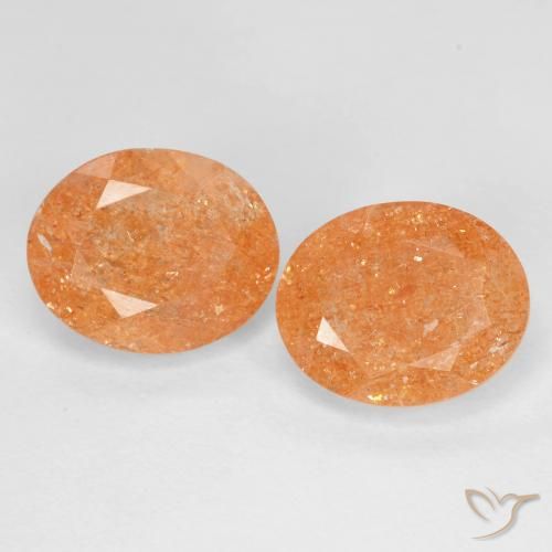 Par de Piedra del Sol Ovalada a juego de 10,1 x 8,3mm - Peso 5,5 ct en total / promedio. 2,75 ct cada uno, color Naranja oscuro en claridad Transparente, piedra preciosa natural No tratado, dureza de Mohs 6 - 6.5, Photo A