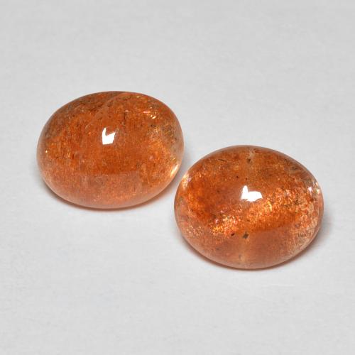 Par de Piedra del Sol Ovalada a juego de 8,8 x 7mm - Peso 3,23 ct en total / promedio. 1,62 ct cada uno, piedra preciosa natural No tratado, color Naranja pomelo con claridad Translúcido, dureza Mohs 6 - 6.5, Photo A