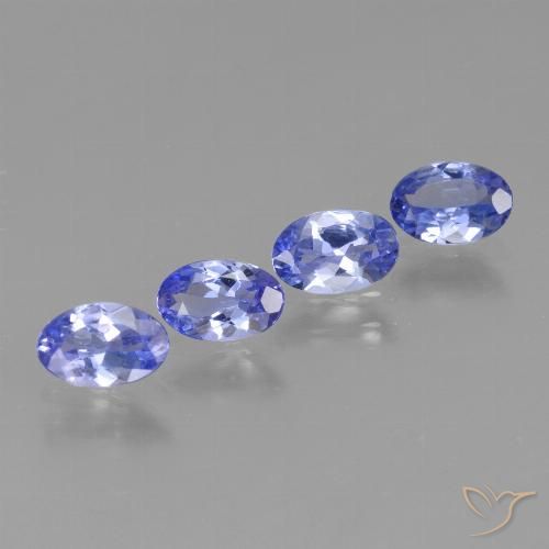 Lot de 4pc Tanzanites Violet Bleu Ovale de Tanzanie - Poids total 1,58 ct / moy. 0,4 ct chaque, taille 5,9 x 3,8mm, couleur : Violet Bleu, dureté de Mohs 6.5 à 7 convient aux bijoux de tous les jours, pierre de sagesse, Expose un excellent feu, Photo A