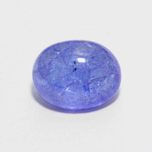 2.41ct Oval Cabochon Blue Tanzanite from Tanzania, Dimension 9 x 7.1mm, Transparent Clarity, Natural heated gemstone, 1pc Tanzanite in Intense Violet Blue Color, Mohs Hardness of 6.5 - 7 suitable for daily wear jewelry, Exhibits Excellent Fire, Photo A
