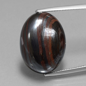 22.3ct Oval Cabochon Multicolor Tiger's Eye Matrix for sale thumb image of 22.3ct Oval Cabochon Multicolor Tiger's Eye Matrix (ID: 405933)