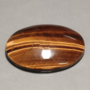 74.22 ct Brown Tiger's Eye Gemstone, Tiger's Eye Gem in Oval Cabochon Shape for Sale.