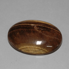 80.28 ct Brown Tiger's Eye Gemstone, Tiger's Eye Gem in Oval Cabochon Shape for Sale.