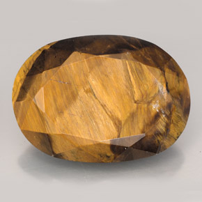 23.17 ct Brown Tiger's Eye Gemstone, Tiger's Eye Gem in Oval Facet Shape for Sale.