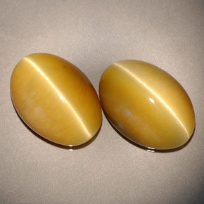 8.84 ct Yellow Tiger's Eye Gemstone, Tiger's Eye Gem in Oval Cabochon Shape for Sale.