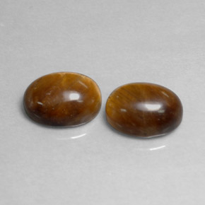 3.98 ct Brown Tiger's Eye Gemstone, Tiger's Eye Gem in Oval Cabochon Shape for Sale.