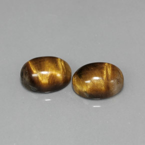 3.95 ct Brown Tiger's Eye Gemstone, Tiger's Eye Gem in Oval Cabochon Shape for Sale.