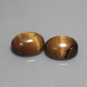 3.99 ct Brown Tiger's Eye Gemstone, Tiger's Eye Gem in Oval Cabochon Shape for Sale.