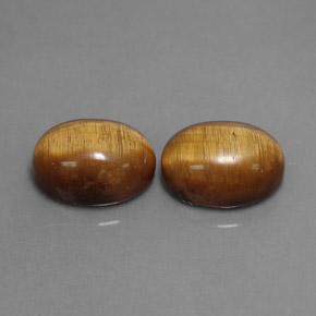 3.98 ct Brown Tiger's Eye Gemstone, Tiger's Eye Gem in Oval Cabochon Shape for Sale.