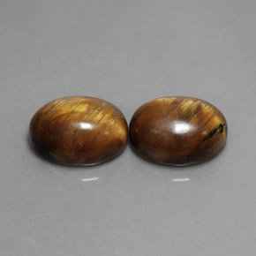 3.99 ct Brown Tiger's Eye Gemstone, Tiger's Eye Gem in Oval Cabochon Shape for Sale.