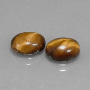 1.59 ct Brown Tiger's Eye Gemstone, Tiger's Eye Gem in Oval Cabochon Shape for Sale.