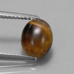 1.55 ct Brown Tiger's Eye Gemstone, Tiger's Eye Gem in Oval Cabochon Shape for Sale.