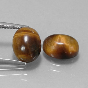 4.04 ct Brown Tiger's Eye Gemstone, Tiger's Eye Gem in Oval Cabochon Shape for Sale.