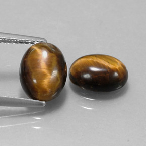 3.03 ct Brown Tiger's Eye Gemstone, Tiger's Eye Gem in Oval Cabochon Shape for Sale.