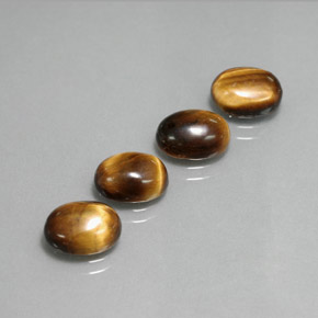 6.46 ct Brown Tiger's Eye Gemstone, Tiger's Eye Gem in Oval Cabochon Shape for Sale.