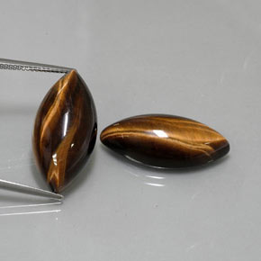 27.00 ct Brown Tiger's Eye Gemstone, Tiger's Eye Gem in Marquise Cabochon Shape for Sale.