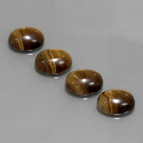 6.25 ct Brown Tiger's Eye Gemstone, Tiger's Eye Gem in Oval Cabochon Shape for Sale.