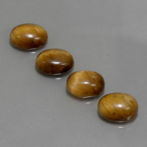 7.04 ct Brown Tiger's Eye Gemstone, Tiger's Eye Gem in Oval Cabochon Shape for Sale.