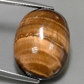 24.80 ct Brown Tiger's Eye Gemstone, Tiger's Eye Gem in Oval Cabochon Shape for Sale.