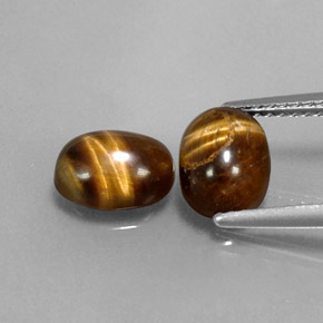 2.82 ct Brown Tiger's Eye Gemstone, Tiger's Eye Gem in Oval Cabochon Shape for Sale.