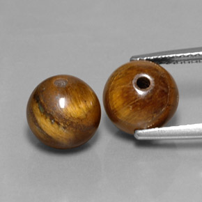 8.30 ct Brown Tiger's Eye Gemstone, Tiger's Eye Gem in Drilled Sphere Shape for Sale.